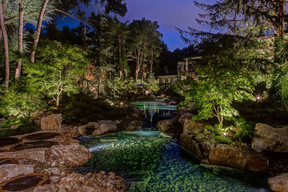 Uplighting is a popular form of pond lighting. Light at water level can highlight features and make ripples sparkle.